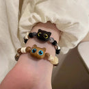 Neues süßes kleines schwarzes Katzenarmband für Frauen Männer Mode lustige Cartoon-Tierperlenarmband handgemachtes trendiges Mädchenschmuckgeschenk