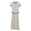 The Portrait | Tweed Patchwork Pleated Midi Dress