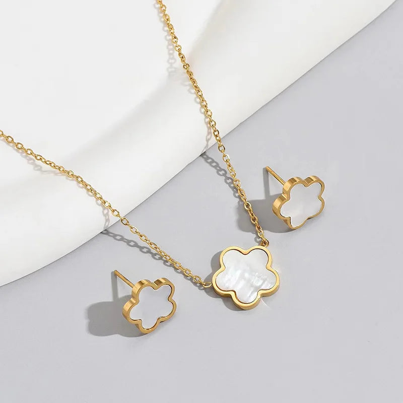 Light luxury high-end plum blossom five leaf lucky grass flower titanium steel necklace earrings, women's five leaf flower set a