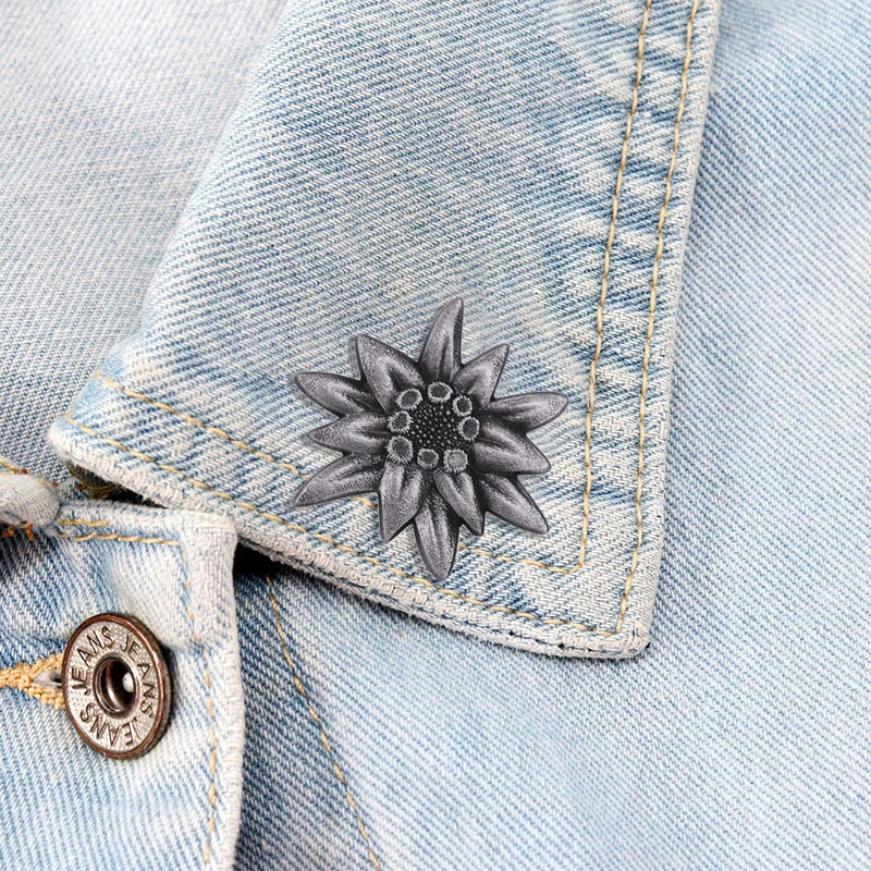 Retro edelweiss brooch. According to tradition, giving this flower to a loved one is a loyal commitment
