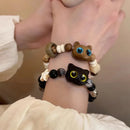 Neues süßes kleines schwarzes Katzenarmband für Frauen Männer Mode lustige Cartoon-Tierperlenarmband handgemachtes trendiges Mädchenschmuckgeschenk
