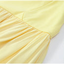 The Helios | Butter Yellow Pleated Gown with Backless Silhouette