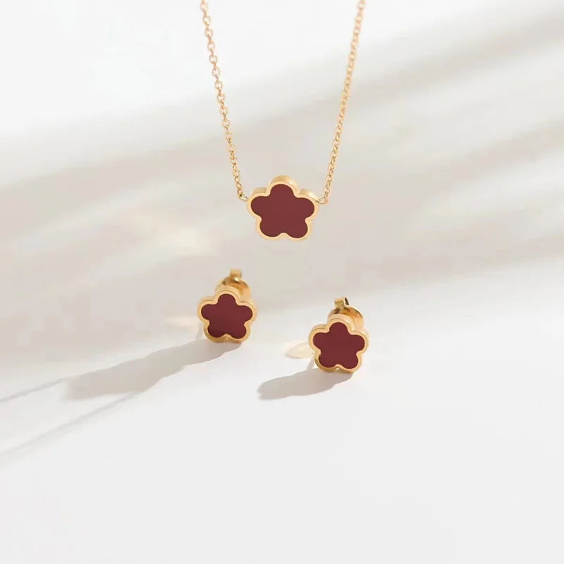 Light luxury high-end plum blossom five leaf lucky grass flower titanium steel necklace earrings, women's five leaf flower set a