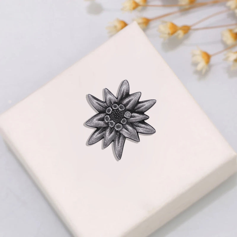 Retro edelweiss brooch. According to tradition, giving this flower to a loved one is a loyal commitment