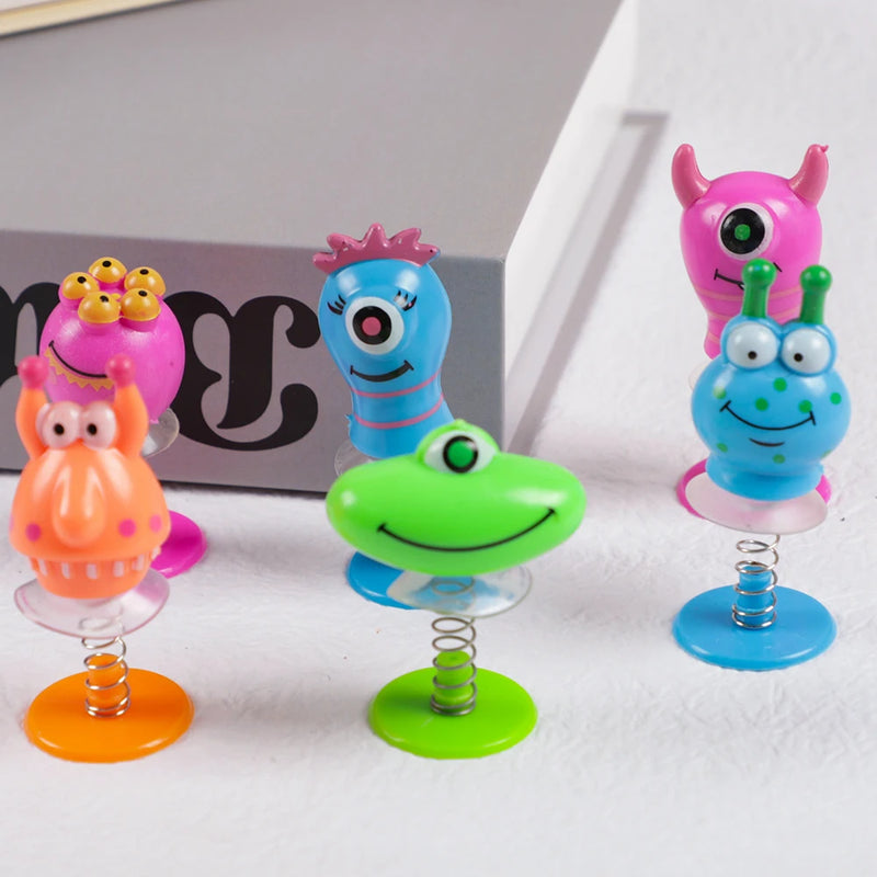 6Pcs Cute Monster Spring Jumping Dolls Toys for Kids Birthday Party Favors Baby Shower Pinata Fillers Gift Bag Carnival Prizes