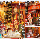 Robotime Book Nook Kit DIY Miniatur Puppenhaus Bausatz 3D Holzpuzzle Dekoration Geschenk mit LED-Beleuchtung Weihnachtsstraße und Haus