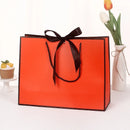 10pcs/lot High Quality Pretty Pink Gift Bag Gift Box Ornament Pajama Book Black Handle With Ribbon Paper Box Bag Kraft Packaging