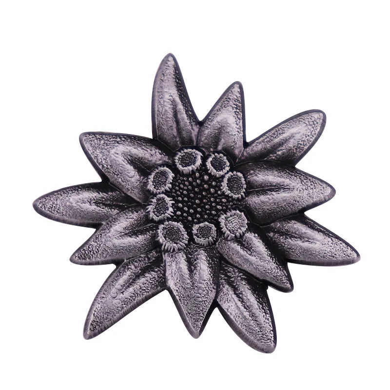 Retro edelweiss brooch. According to tradition, giving this flower to a loved one is a loyal commitment