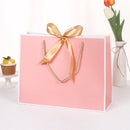 10pcs/lot High Quality Pretty Pink Gift Bag Gift Box Ornament Pajama Book Black Handle With Ribbon Paper Box Bag Kraft Packaging