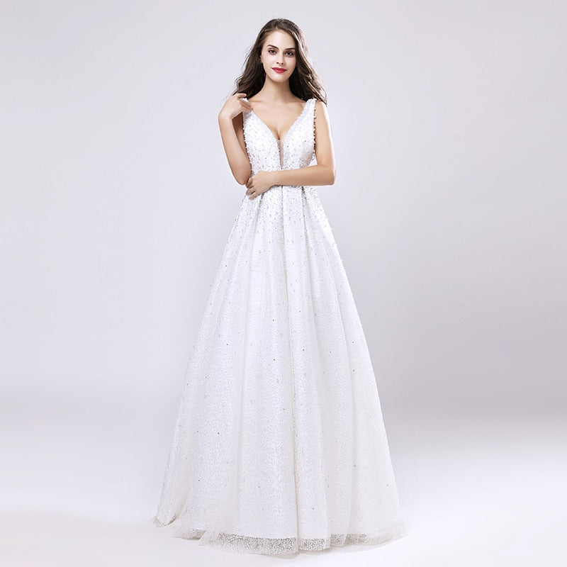 Luxus-Abendkleider lang Dubai Arabisch A-Linie Perle Backless Partykleider bodenlangen ärmellosen formalen Robe de Soiree LX442