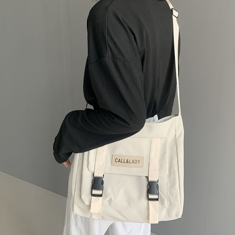 Bolso de mensajero sencillo clásico de moda para mujer, bolso elegante de cartero de Corea del Sur para mujer, bolso escolar de lona impermeable de nailon para estudiantes