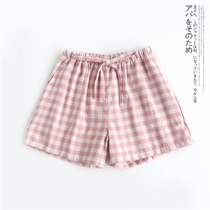 Par de pijamas de verano pantalones cortos de gasa de algodón estilo japonés simple cintura elástica casual de gran tamaño entramado hombres y mujeres pantalones de casa