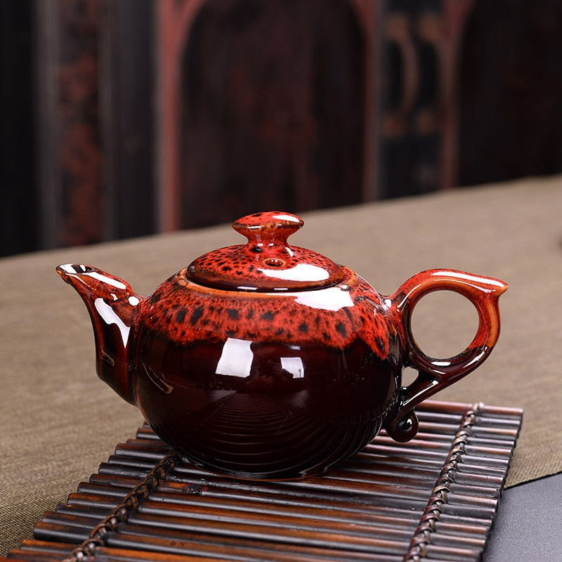 Tetera tradicional china con esmalte de cambio de horno, servicio de juegos de té de diseño elegante, regalos creativos de tetera roja de China