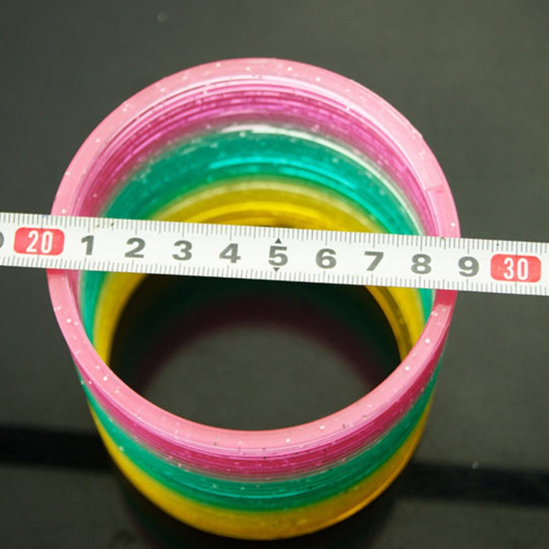 Juguetes divertidos de círculo arcoíris para niños, 1 Uds., desarrollo temprano, bobina de resorte de plástico plegable educativo, juguetes mágicos creativos para niños