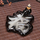 Una variedad de quemadores de incienso de flujo inverso, torre de incienso, adornos de quemador de incienso de cerámica