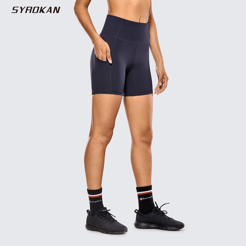 SYROKAN Pantalones cortos deportivos transpirables de lujo con sensación de desnudo para mujer Pantalones cortos con control de barriga de cintura alta con bolsillos laterales-6 pulgadas