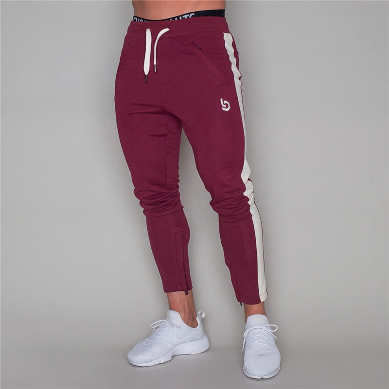 2019 Hombres Joggers Pantalones casuales Fitness Hombres Ropa deportiva Pantalones Pantalones pitillo Pantalones de chándal Pantalones negros Gimnasios Jogger Pantalones de chándal