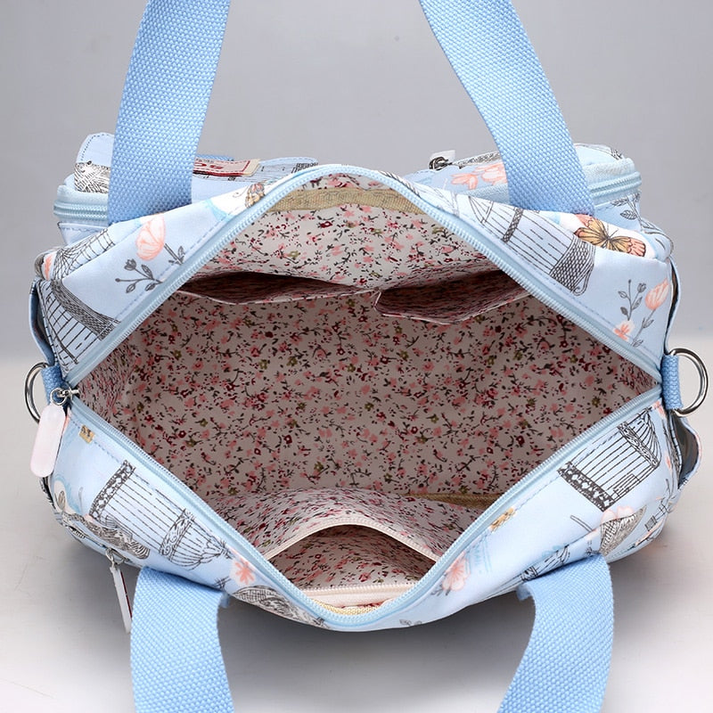 Nuevos bolsos de hombro de nailon multicapa para mujer, bolsos sencillos a la moda para chicas, bolsos de mensajero, bolsos cruzados con flores impresas