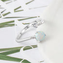Silberfarbene Damenringe Zirkonia Verstellbarer Wickelring mit synthetischem runden blauen Opal Hochzeit Modeschmuck für Damen