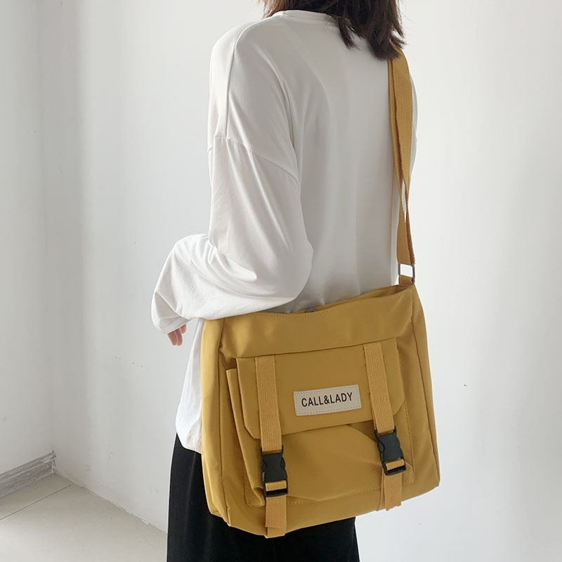 Bolso de mensajero sencillo clásico de moda para mujer, bolso elegante de cartero de Corea del Sur para mujer, bolso escolar de lona impermeable de nailon para estudiantes