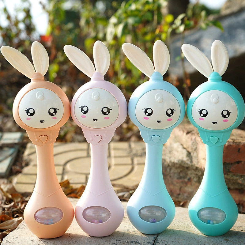 Baby Music Flashing Rattle Toys Rabbit Teether Hand Bells Mobile Infant Stop Weep Tear Rattles Newborn Early Educational Toy 18M