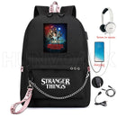 Nueva mochila Stranger Things HELLFIRE, mochila multifunción de lona de viaje con carga USB para estudiantes, mochila escolar para adolescentes, niños y niñas