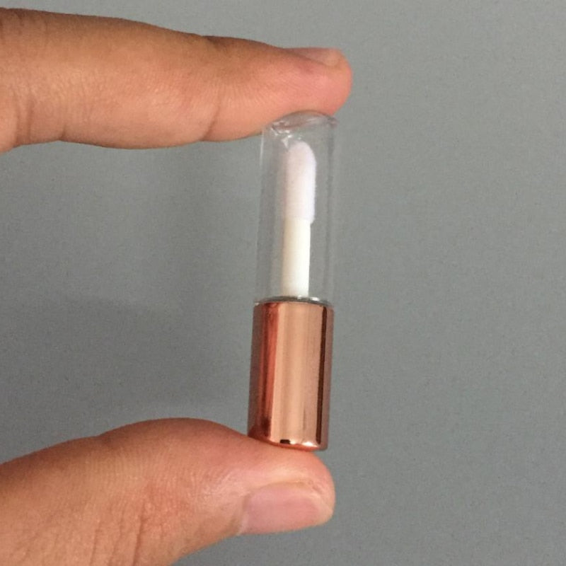 1,2 ml Roségold, eleganter Behälter für flüssigen Lippenstift aus Kunststoff, runde Mini-Lipgloss-Probenflasche